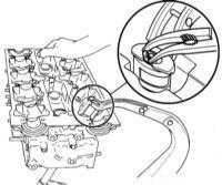 4.7.5 Разборка головки цилиндров Opel Corsa